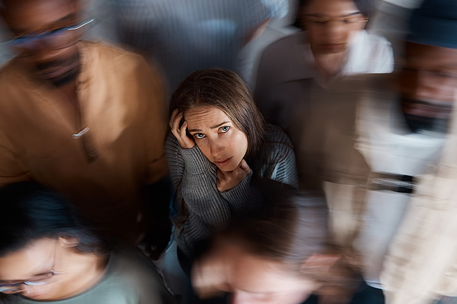 Woman Feeling Anxious in a Crowd